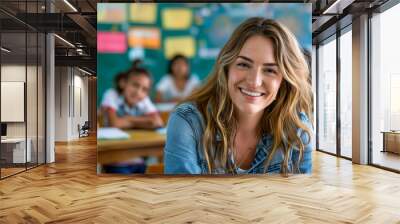 A smiling woman in a classroom with children. Wall mural