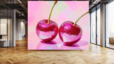 Two pink cherries sitting on top of each other on a reflective surface Wall mural