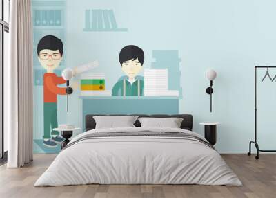 Two asian office clerk inside the office. Wall mural