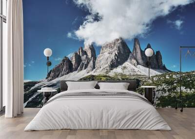 Mountainous landscape with clouds in Three Peaks Nature Park in Italian dolomite Alps, Sesto Dolomites in South Tyrol Wall mural