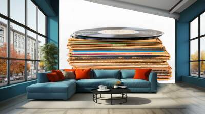 A stack of vintage vinyl records, each one a timeless classic, showcased against a clean white background. Wall mural