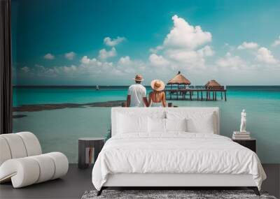 Cancun travel destination. Tourist couple on sunny sandy beach with beautiful landscape. Generative AI. Wall mural