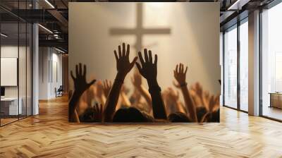 Christian worshipers raising hands up in the air in front of the cross Wall mural