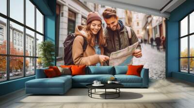 Couple mixed race traveling in summer time in greek city looking at the map. Honeymoon trip, backpacker tourist, tourism or holiday vacation travel concept. Wall mural