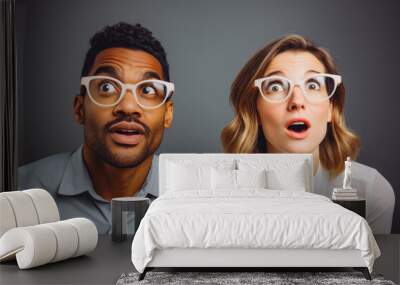 Man and woman trying new glasses in the optics, mixed race. Choosing new glasses. Couples in optics store, shopping for glasses, mixed race. Wall mural