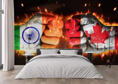 India Vs Canada clash concept background with painted fist and glowing fire behind, backdrop. Canada vs India hands with flag painted Wall mural