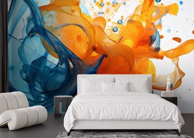 Orange and Blue Ink drops in water on white background Wall mural