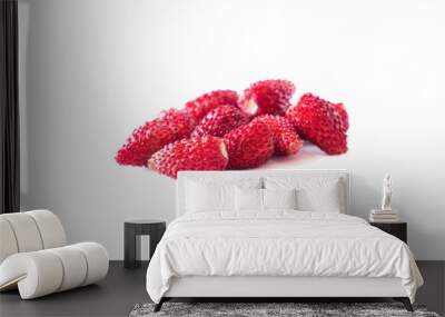 Fresh strawberries lay on white background. Background of wildberries. Ripe wild strawberry on a white background. Wild strawberries with copy space for text. Top view. Wall mural