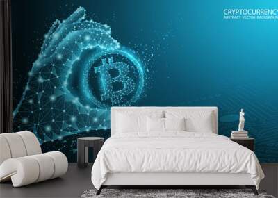 Blue abstract technology background. Vector. Polygonal human hand holds bitcoin. Electronic cryptocurrency and modern technology. Blockchain Low poly image. Internet banking and finance. Wall mural