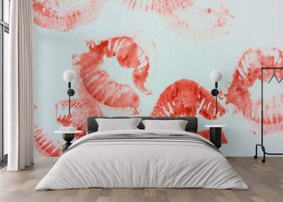 Set of sexy pink red female lip prints on white paper background top view. Kisses flatly. Lipstick prints, marks. Femininity, flirt, love concept. World Kissing Day. Valentine's Day. Lovely backdrop. Wall mural