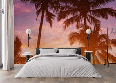 palm trees on the background of a beautiful sunset Wall mural