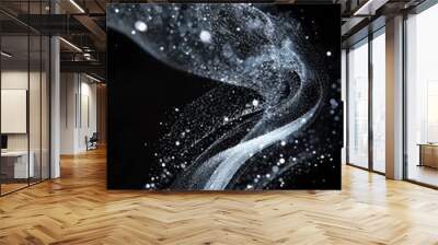 A mesmerizing arrangement of silver dots undulates gracefully, creating a dynamic wave effect on a deep black background, emphasizing motion and fluidity. Wall mural