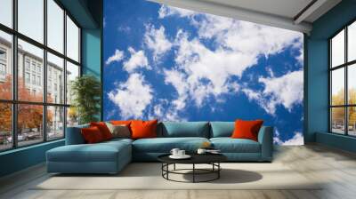 gorgeous white clouds in vibrant blue heaven Wall mural