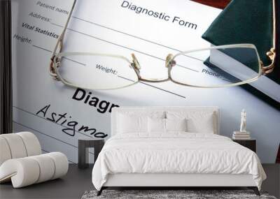 Diagnosis list with Astigmatism and glasses. Eye disorder concept. Wall mural