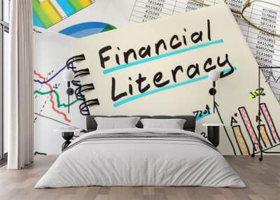 Financial Literacy written on a notepad sheet.   Wall mural