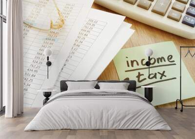 Income tax sign and financial report. Wall mural