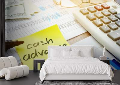 Memo stick about cash advance and calculator. Wall mural