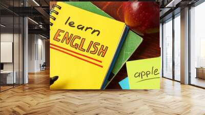 Notebook with learn English  sign. Education concept. Wall mural