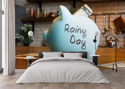 Piggy bank and savings for rainy day. Wall mural