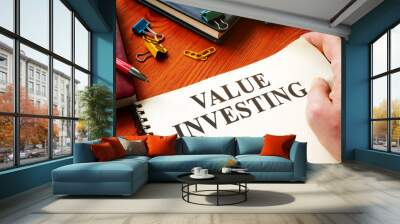 Value investing financial report on the wooden surface. Wall mural