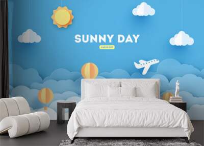 Cloudscape , blue sky with clouds and sun , paper art style. concept. paper cut design with balloons and airplane. Wall mural