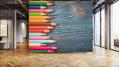 Group of color pencils on rustic wooden background Wall mural