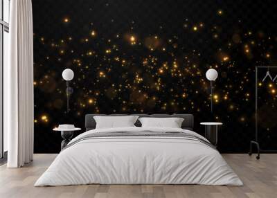 Vector gold sparkles on an isolated transparent background. Atomization of golden dust particles png. Glowing particles png. Gold dust. Light effect. Wall mural