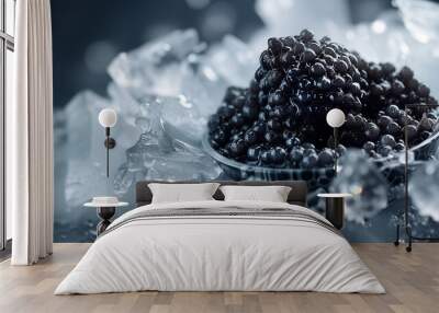 Exquisite black fish caviar beautifully presented on an icy black backdrop. Wall mural