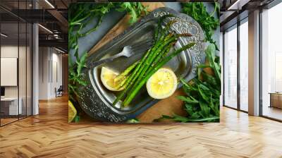 baked asparagus with lemon in foil Wall mural