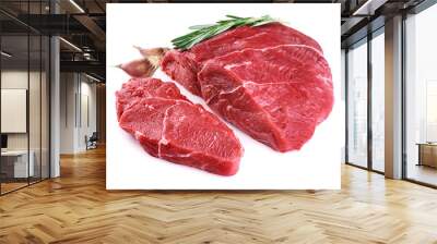 Raw beef meat, garlic and rosemary isolated on white background. Wall mural