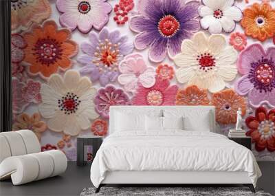 Floral background with embroidered volumetric flowers, light colors. Wall mural