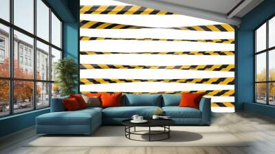 Isolated warning tape with yellow and black stripes. Stretched caution ribbon set. Wall mural