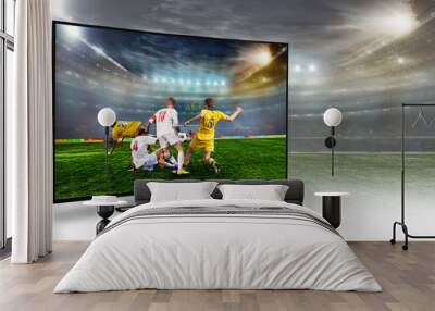 Soccer ball on the field of stadium with light Wall mural