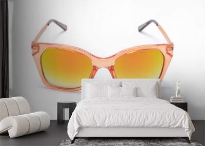 Sunglasses in a transparent yellow frame isolated on white Wall mural