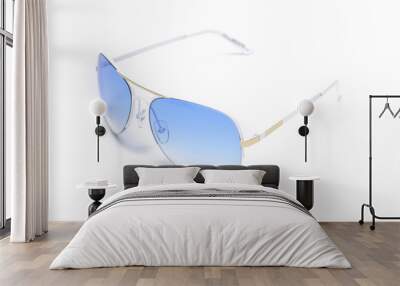 Sunglasses with blue glass in an iron frame isolated on white Wall mural