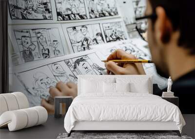 Artist sketching detailed storyboards for animated video project Wall mural