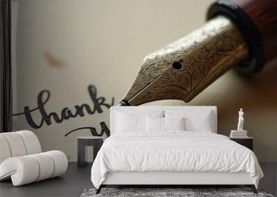 Close up of fountain pen writing thank you on paper Wall mural