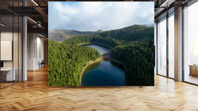 Magical aerial view of the Lake of Empadadas in Sete Cidades, landscape view of the lagoon with a light of sun and some mist. São Miguel island in the Azores. Wall mural