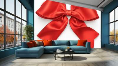 Um luxuoso laço de cetim vermelho lindamente amarrado sobre um fundo branco, perfeito para embrulhos de presentes, decorações festivas e apresentações elegantes. Wall mural