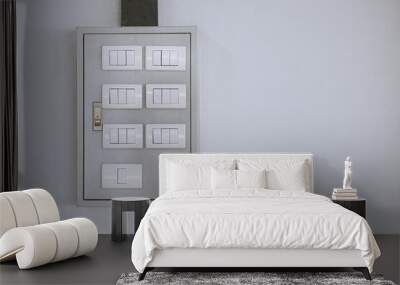 A white box with switches on it Wall mural