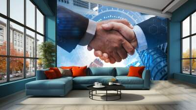 business man handshake with global network link connection, graph chart of stock market graphic diagram and city background, digital technology, internet communication, teamwork, partnership concept Wall mural