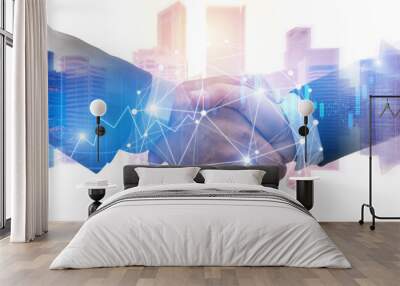 double exposure image of investor business man handshake with partner with digital network link connection and graph chart of stock market and cityscape background, investment and partnership concept Wall mural