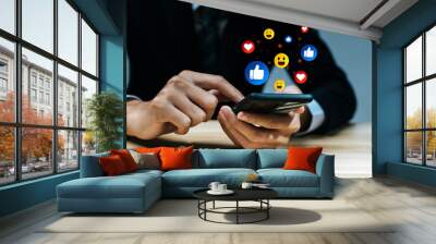 Mobile Application. business man touching mobile smart phone with graphic social network notification icon diagram, social media, internet connection, social media, digital online technology concept Wall mural