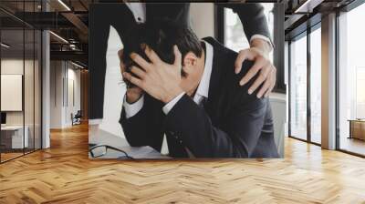 sadness asian business man upset about life problems with support from his best friend and sitting in home office, encouragement, fired from job, business problem, financial and investment concept Wall mural