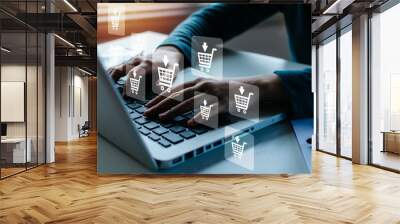 Shopping Online. woman hand online shopping on laptop computer with virtual graphic icon diagram on desk, payment online, digital marketing, business finance, internet network technology concept Wall mural