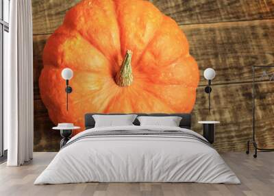  Pumpkin close-up on a wooden background. Wall mural