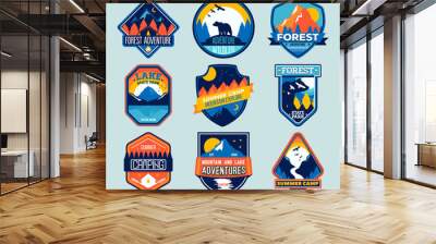 Set of isolated badges with mountain peaks and forest camp. Forest camp labels in vintage style. Mountain tourism, hiking.  Wall mural