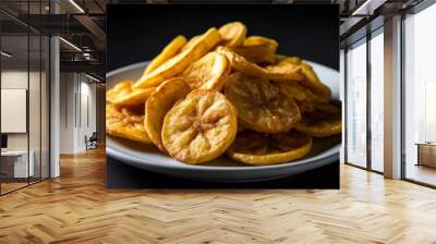  Deliciously crispy banana chips on a plate Wall mural