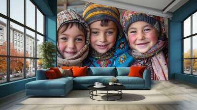 Children of Uzbekistan. Three smiling children in colorful traditional attire posing for the camera.  Wall mural