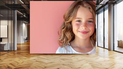 A smiling Gen Alpha girl around 9 years old with wavy brown hair Wall mural